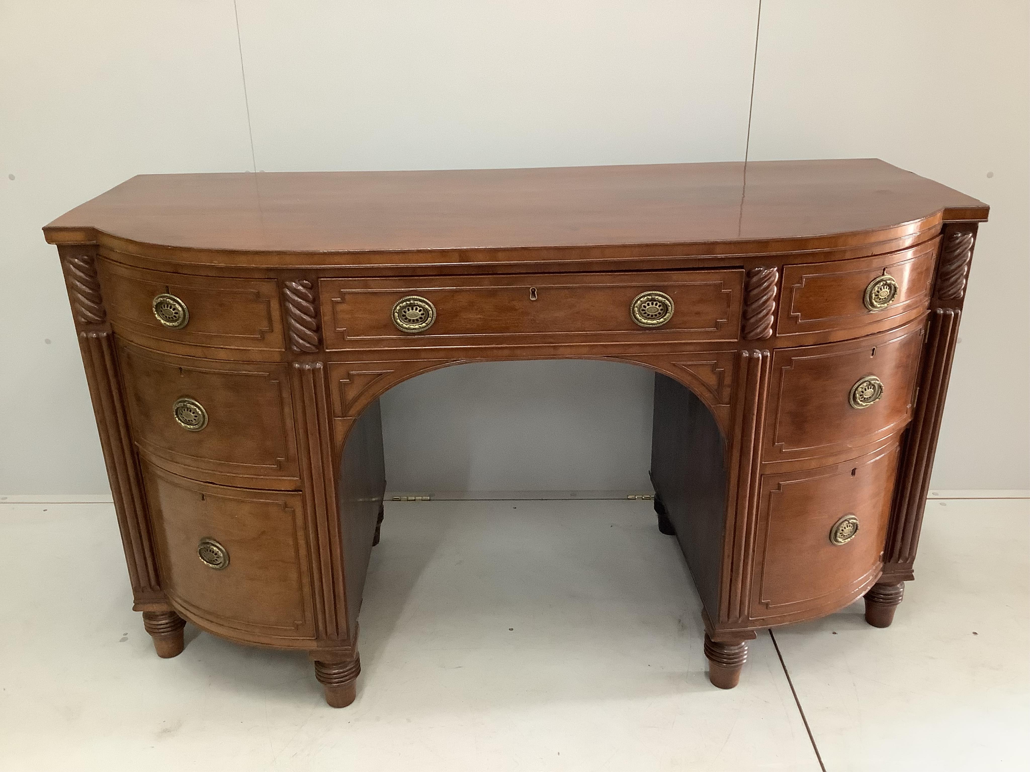 A George IV mahogany bow front sideboard, width 168cm, depth 68cm, height 94cm